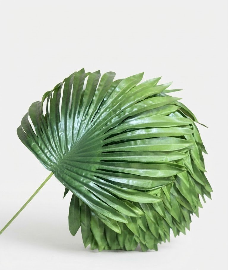 Vibrant green 45cm artificial fan palm leaf with realistic ridged texture for tropical home décor in Lagos, Nigeria