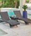 Woven rattan chaise lounge chair for indoor or outdoor use, comfortable sun lounger for home décor in Lagos Nigeria