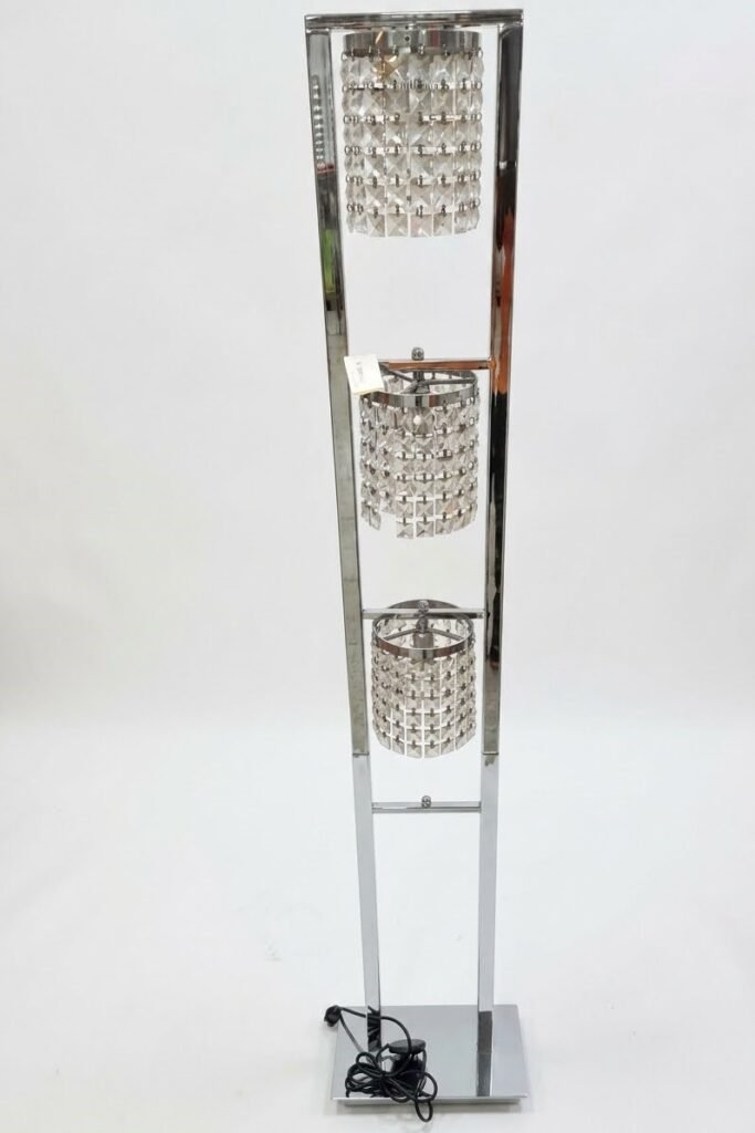 3 light crystal floor lamp with chrome finish and crystal shades for luxury home lighting in Lagos Nigeria modern decor