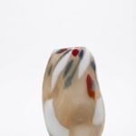Decorative multi-colour striped ceramic vase for artistic home styling and flower arrangements in Lagos, Nigeria
