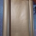 Premium gold foil patterned Kraft paper roll for luxury gift wrap and wall decor in Lagos, Nigeria