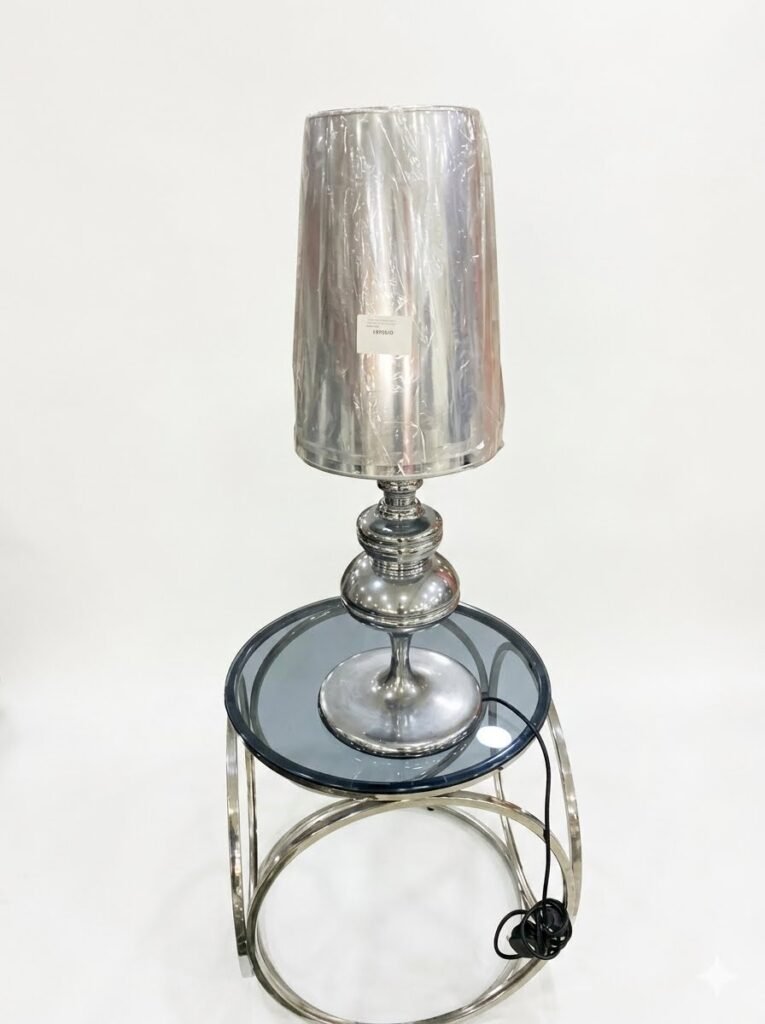 Tall silver metal table lamp with matching silver shade for luxury bedroom and lounge lighting in Lagos, Nigeria