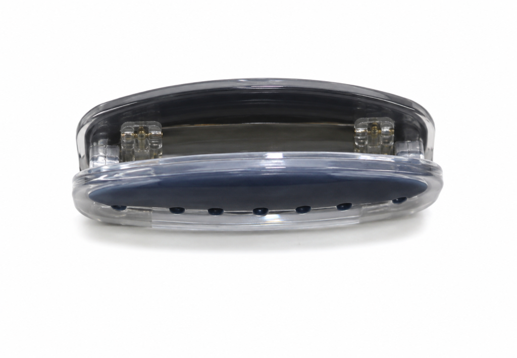 Clear magnetic office clip with a comfortable blue rubber grip for holding papers in Lagos, Nigeria for holding papers in Lagos, Nigeria