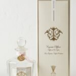 Octagonal glass Pamplemousse reed diffuser with a gold charm and elegant cream gift box, Lagos, Nigeria