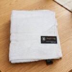 Soft white luxury cotton hand towel for bathroom and guest use in Lagos, Nigeria