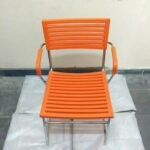 Orange Seat Chrome Frame Stacking Chair