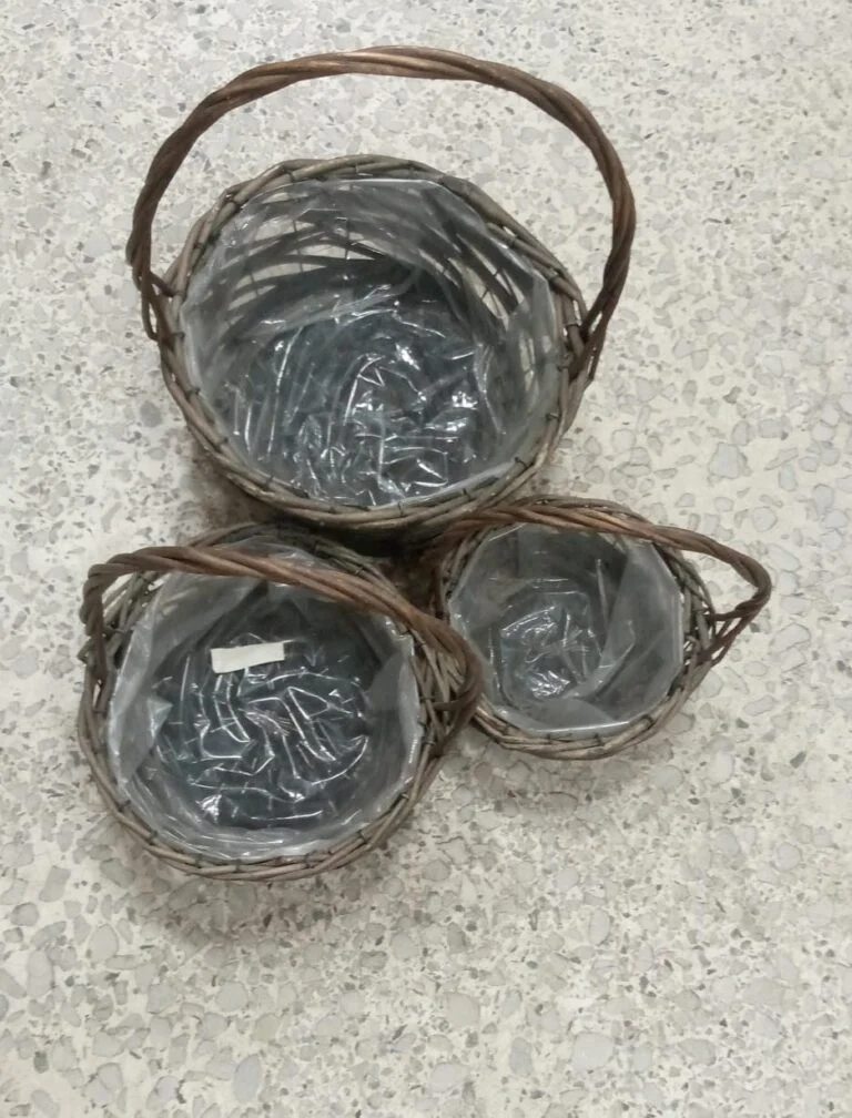 Colorful gift bags, decorative baskets, and wrapping paper arranged for gifting in Lagos, Nigeria