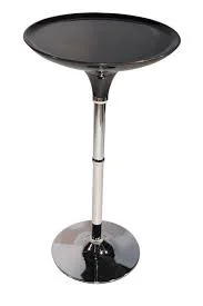 Modern bar table set in a Lagos home with matching stools and a sleek contemporary design