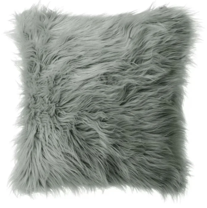 Colorful and stylish throw pillows arranged on a sofa in a living room in Lagos, Nigeria