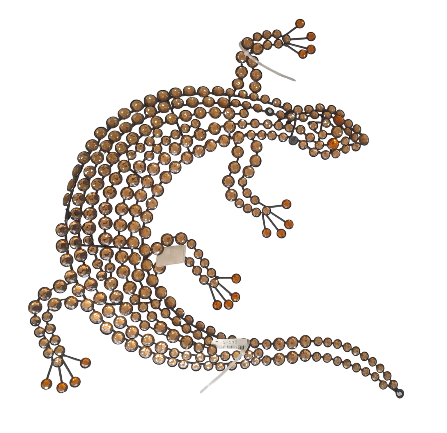 Contemporary metal wall art sculpture displayed on a living room wall in Lagos, Nigeria