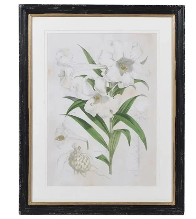 Colorful canvas wall art displayed on a living room wall in a modern Lagos home