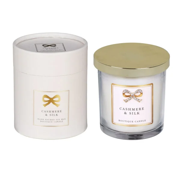 Aromatic candles glowing softly in a Lagos living room, adding a calm and inviting vibe