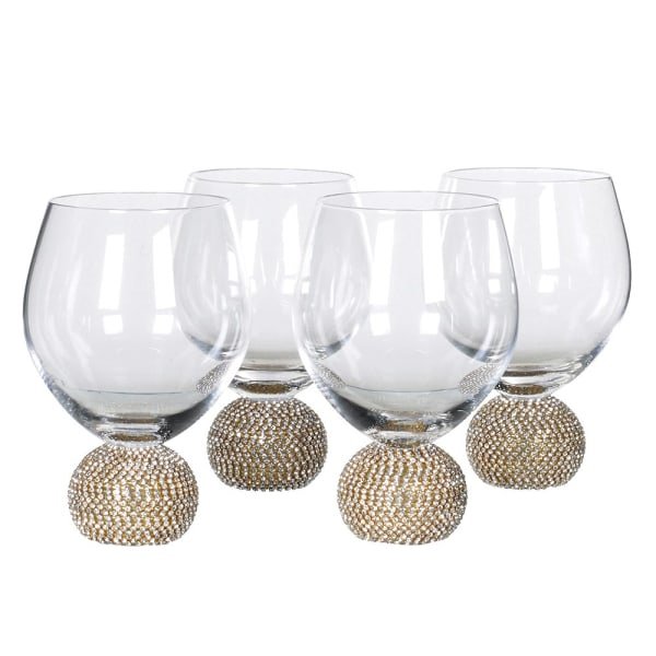 Set of four gold stemless drinking glasses for dining in Lagos Nigeria