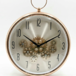 Seven Engine Light Rose Gold Clock with hanging ring, elegant wall design for homes and offices in Lagos, Nigeria