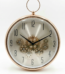 Seven Engine Light Rose Gold Clock with hanging ring, elegant wall design for homes and offices in Lagos, Nigeria