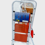 White steel 3 step ladder with orange details for household use in Lagos, Nigeria